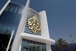 The Al Jazeera Media Network logo is seen on its headquarters building in Doha, Qatar June 8, 2017.